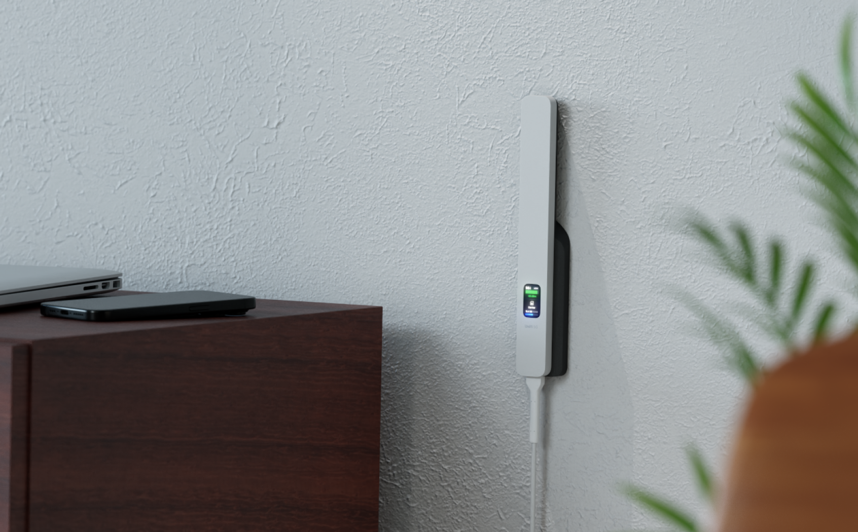 UniFi 5G Backup U5G aan de wand naast een bureau