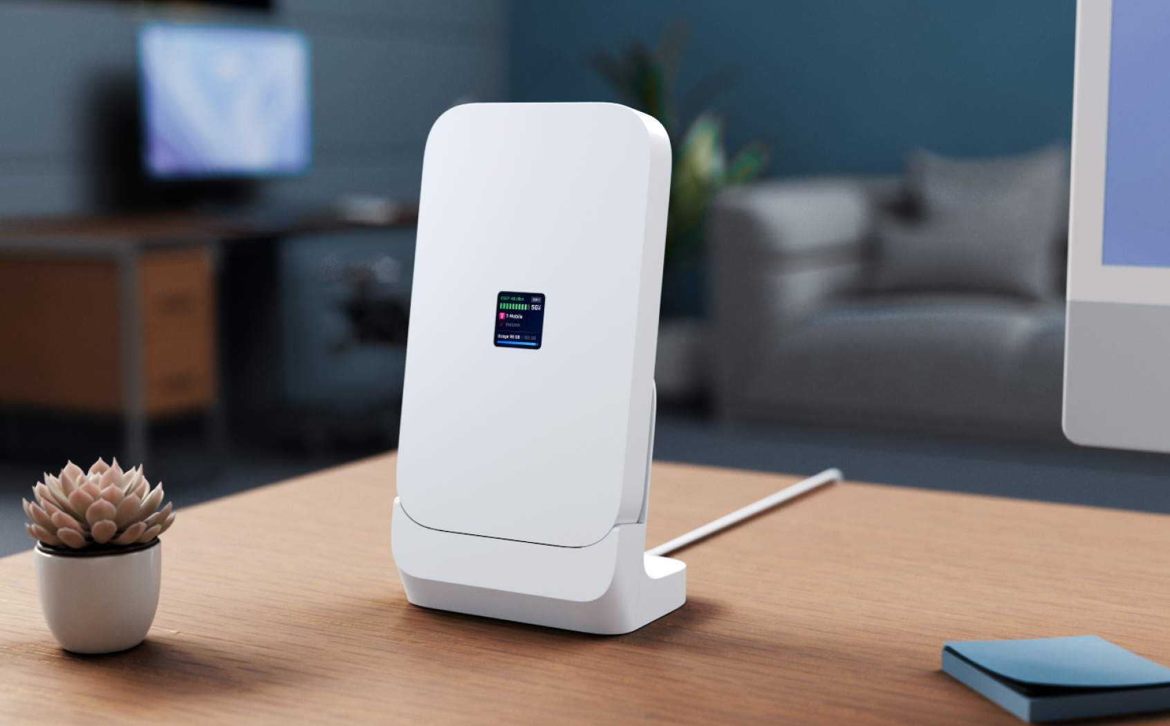 UniFi 5G Max op de meegeleverde bureaustandaard naast een werkplek